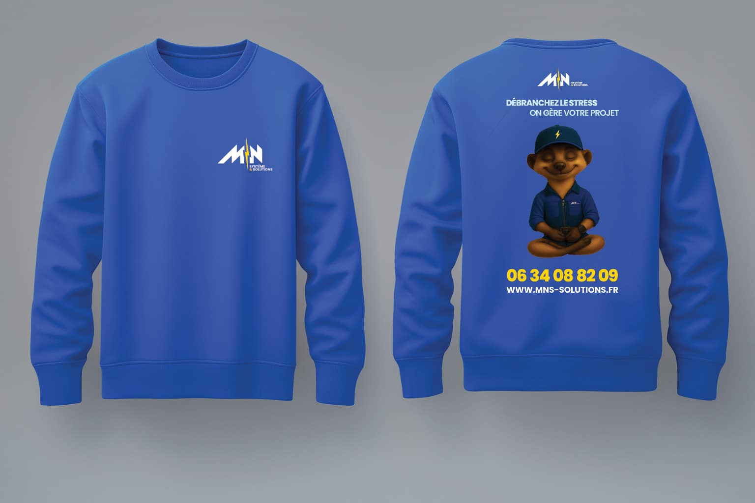 Sweatshirt MN Système & Solutions bleu. Mascotte suricate zen. Slogan "DÉBRANCHEZ LE STRESS ON GÈRE VOTRE PROJET". Tél : 06 34 08 82 09.